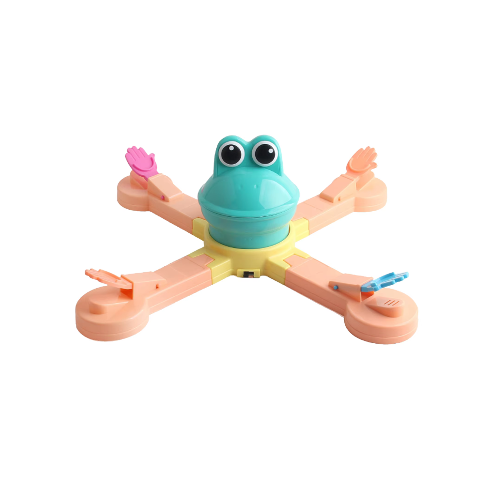 A colorful board game frog feeding game with multiple pieces and a frog figure in the center.